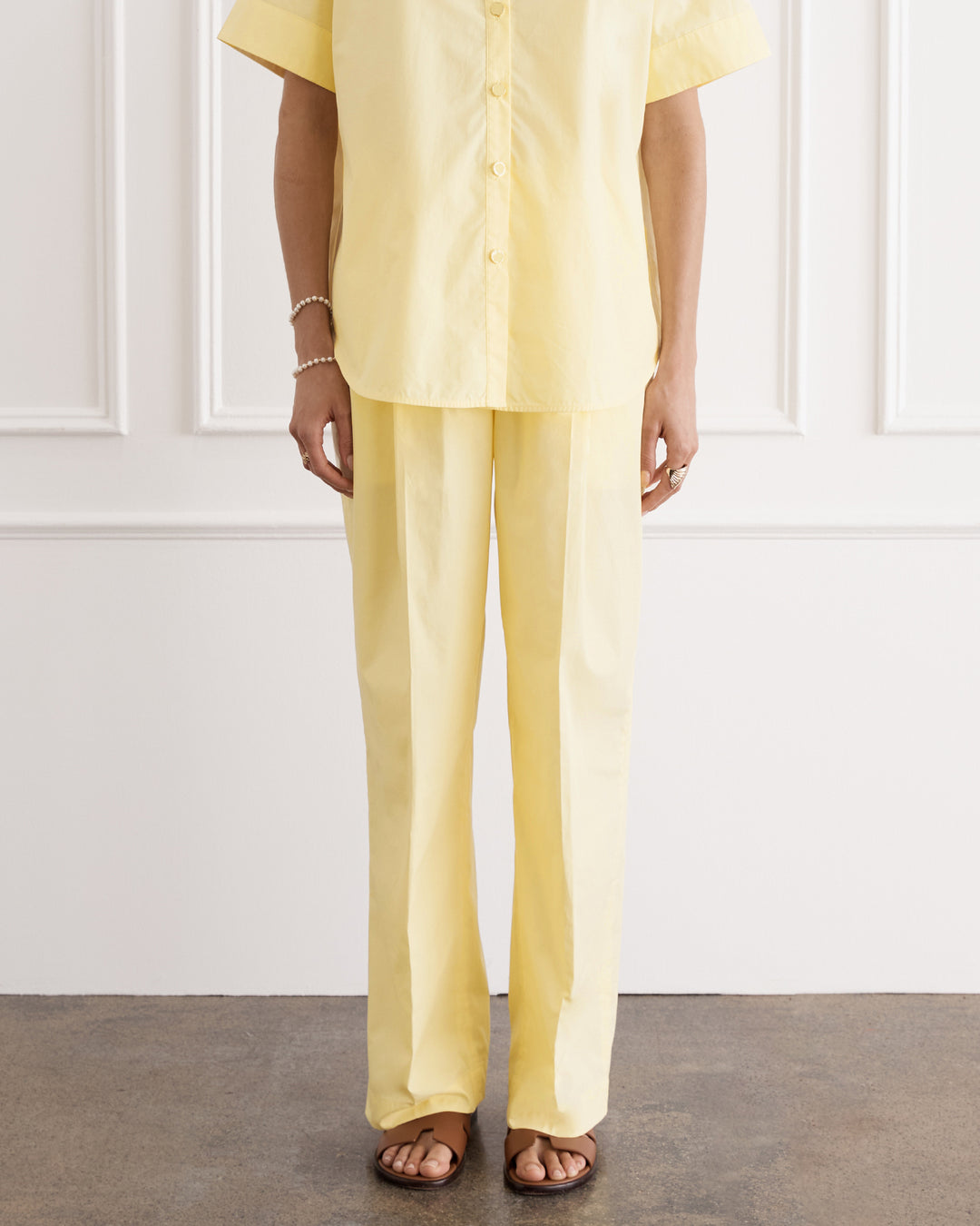 Yellow pleated trousers 