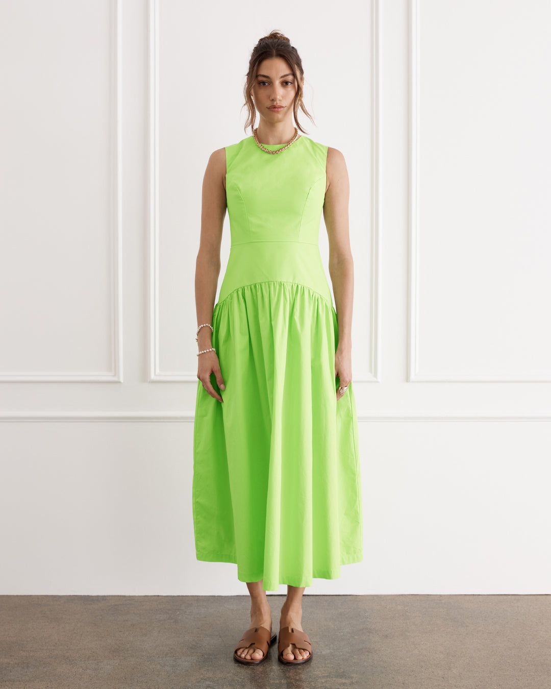 Green sleeveless maxi dress with drop waist